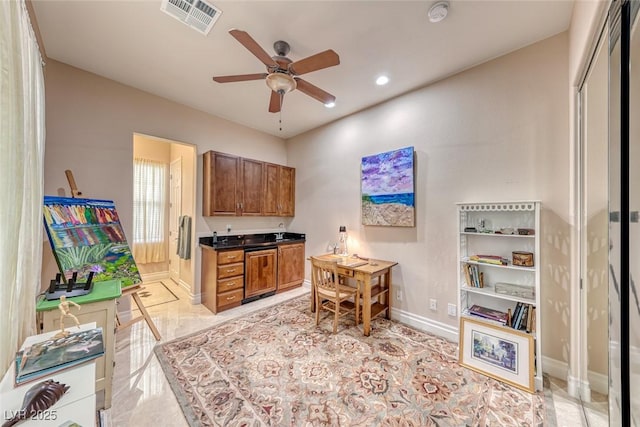 home office featuring ceiling fan, recessed lighting, visible vents, and baseboards