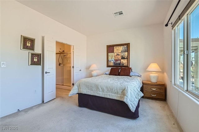 bedroom featuring multiple windows, visible vents, and light colored carpet