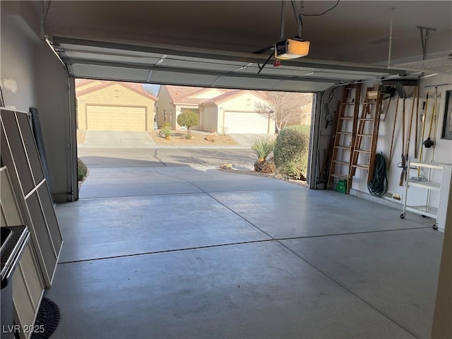 garage featuring a garage door opener