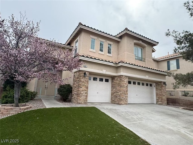 mediterranean / spanish-style home with stucco siding, an attached garage, stone siding, driveway, and a front lawn