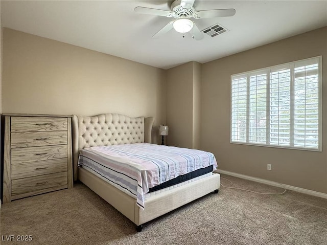 bedroom with ceiling fan, carpet, visible vents, and baseboards