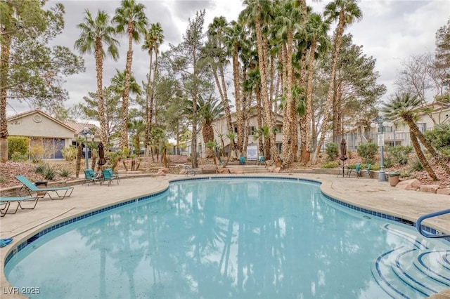 5265 Caspian Springs Dr Unit 201, Las Vegas, NV 89120 - community pool with a patio area