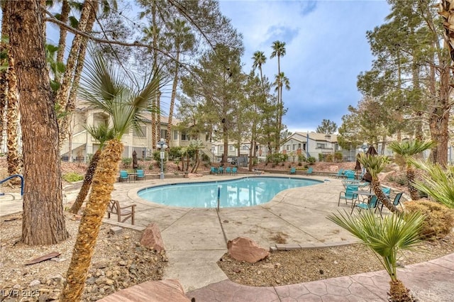 5265 Caspian Springs Dr Unit 201, Las Vegas, NV 89120 - community pool featuring a patio area