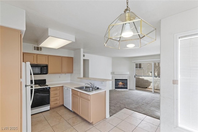 5265 Caspian Springs Dr Unit 201, Las Vegas, NV 89120 - kitchen with white appliances, a sink, open floor plan, a peninsula, and light tile patterned floors