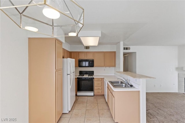 5265 Caspian Springs Dr Unit 201, Las Vegas, NV 89120 - kitchen featuring white appliances, a sink, a peninsula, light countertops, and light brown cabinets