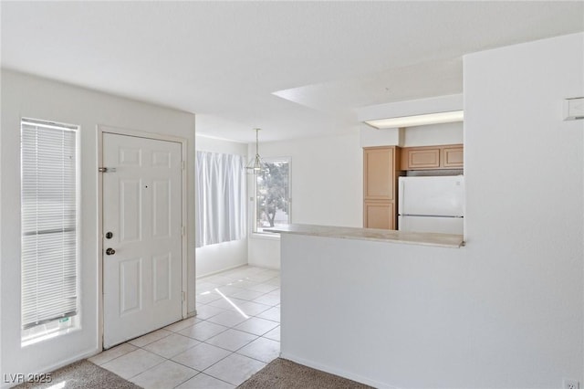 5265 Caspian Springs Dr Unit 201, Las Vegas, NV 89120 - entryway featuring light tile patterned floors and baseboards