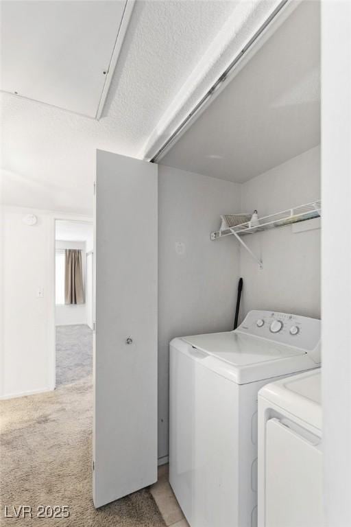 5265 Caspian Springs Dr Unit 201, Las Vegas, NV 89120 - laundry area featuring attic access, independent washer and dryer, and light colored carpet