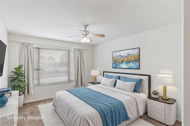 5265 Caspian Springs Dr Unit 201, Las Vegas, NV 89120 - bedroom featuring light colored carpet, baseboards, and a ceiling fan
