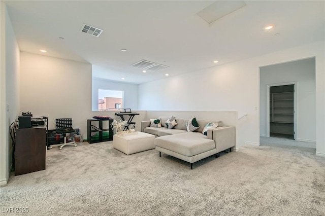 living area featuring carpet, visible vents, baseboards, and recessed lighting