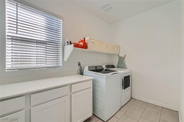 laundry area with separate washer and dryer