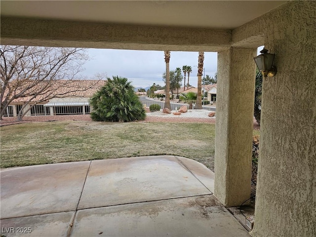 view of yard with a patio and fence