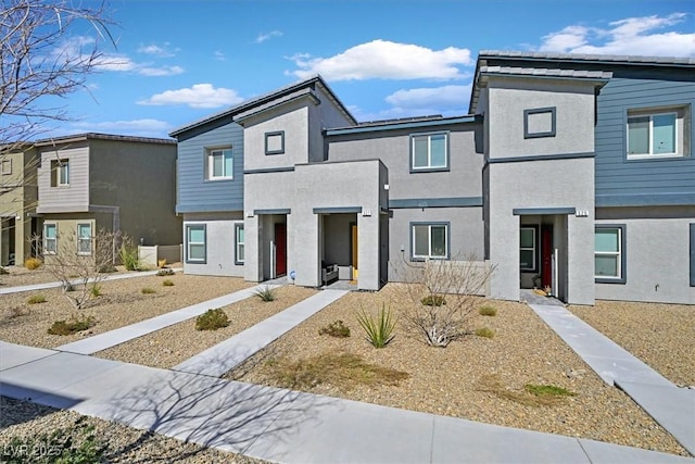 view of property with stucco siding