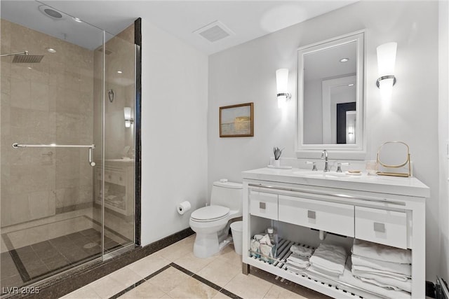 full bathroom featuring visible vents, toilet, a stall shower, vanity, and tile patterned floors