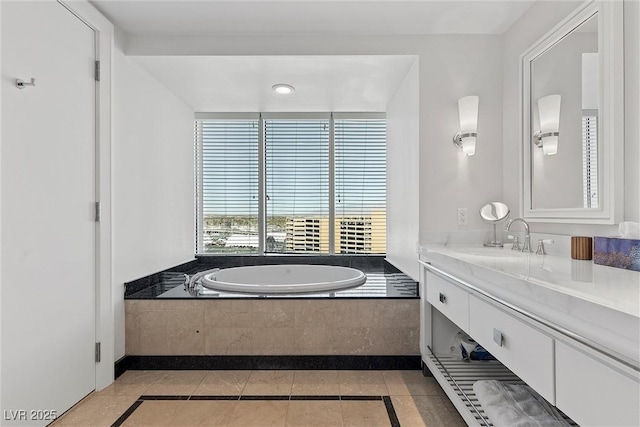 2700 Las Vegas Blvd Unit 1202, Las Vegas, NV 89109 - bathroom with a bath, vanity, and inlaid floor details