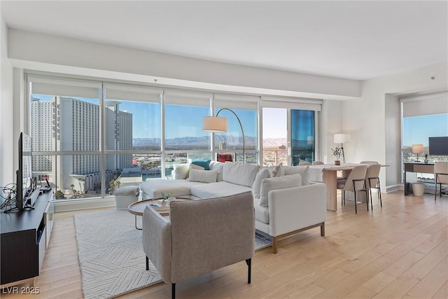 2700 Las Vegas Blvd Unit 1202, Las Vegas, NV 89109 - living room with light wood-style flooring and plenty of natural light