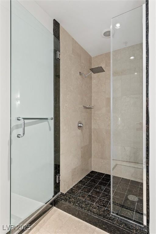 full bathroom with a stall shower