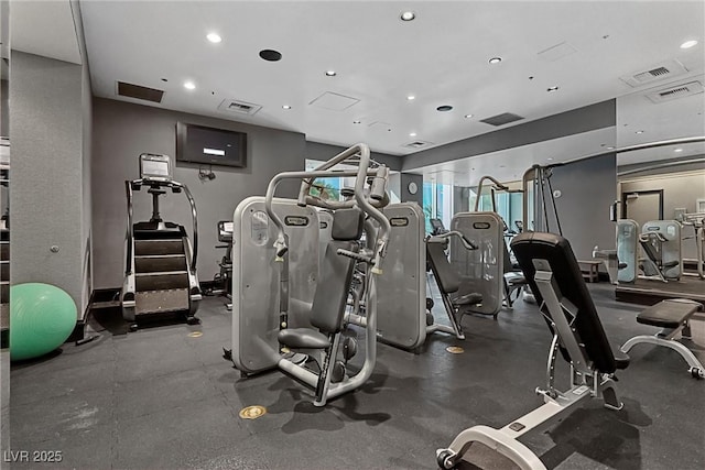 exercise room with recessed lighting and visible vents