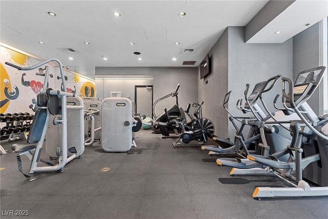 exercise room with visible vents and recessed lighting