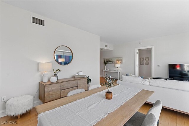 2700 Las Vegas Blvd Unit 1202, Las Vegas, NV 89109 - dining room with wood finished floors and baseboards