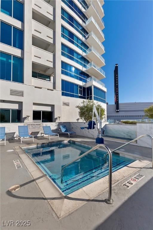 2700 Las Vegas Blvd Unit 1202, Las Vegas, NV 89109 - community pool featuring a patio