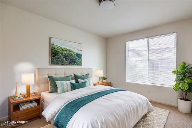 4542 Townwall St, Las Vegas, NV 89115 - bedroom featuring baseboards and light colored carpet