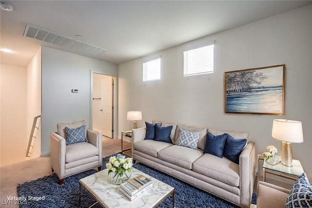 4542 Townwall St, Las Vegas, NV 89115 - living area with carpet floors and visible vents