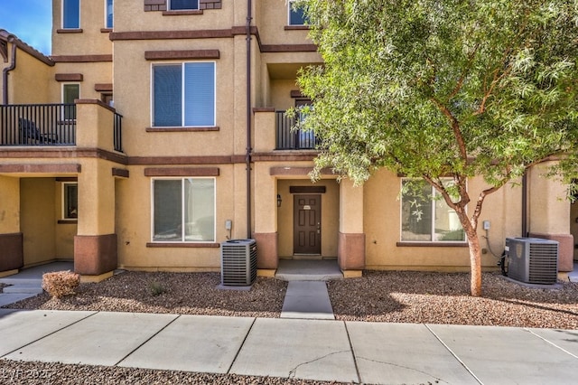 4542 Townwall St, Las Vegas, NV 89115 - view of front of home featuring central AC unit and stucco siding