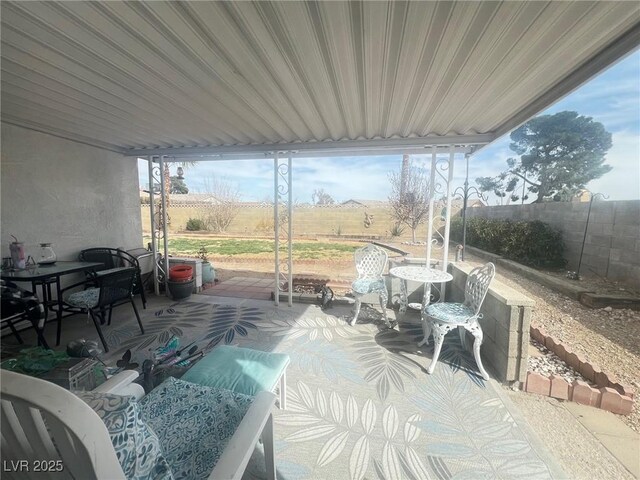 view of patio with fence