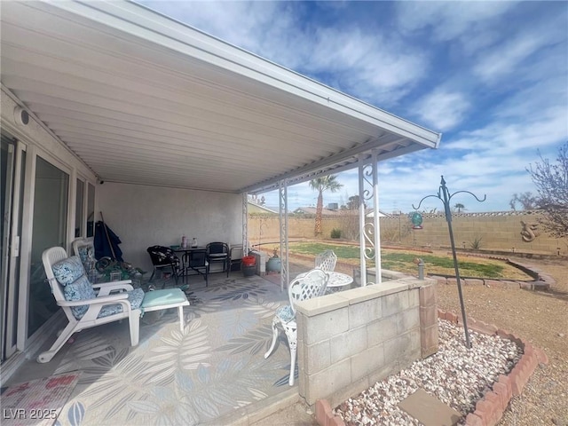 view of patio with fence