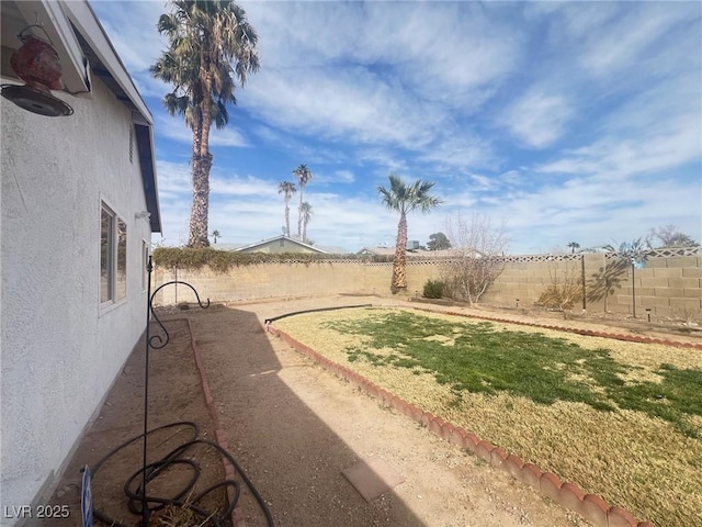 view of yard featuring a fenced backyard