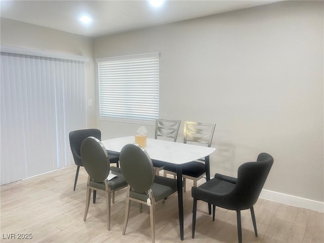 4194 Greenpoint St, Las Vegas, NV 89147 - dining area featuring light wood-type flooring and baseboards