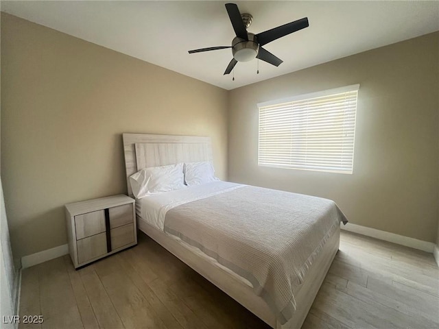4194 Greenpoint St, Las Vegas, NV 89147 - bedroom featuring light wood-style floors and ceiling fan