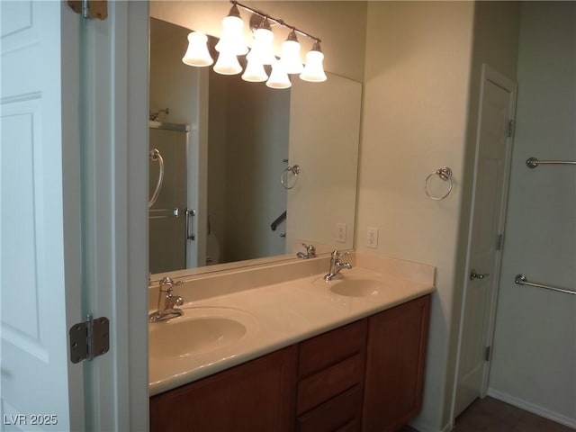 bathroom featuring double vanity and a sink