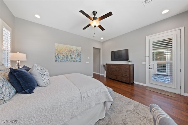 bedroom with recessed lighting, visible vents, a ceiling fan, wood finished floors, and baseboards