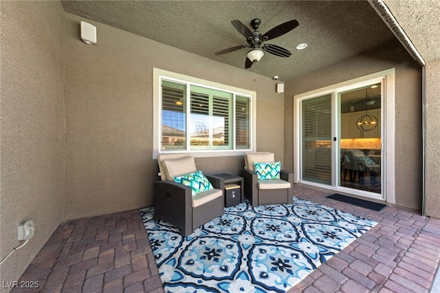 view of patio / terrace with a ceiling fan