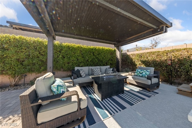 view of patio with a fenced backyard and an outdoor living space