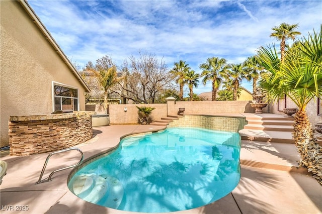 view of swimming pool with a fenced in pool, a fenced backyard, and a patio area