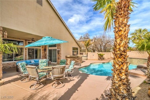 view of swimming pool with a fenced in pool, a fenced backyard, and a patio area