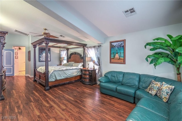 bedroom featuring visible vents and wood finished floors