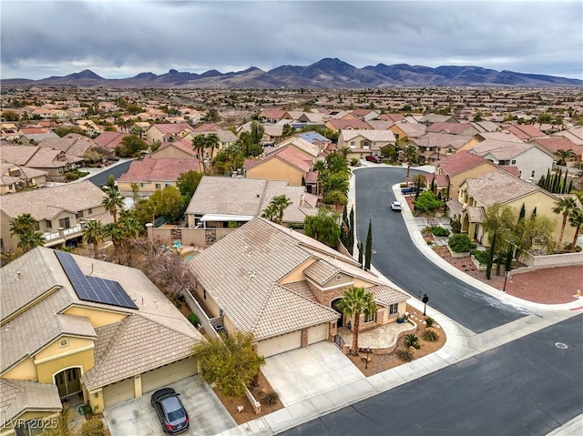 drone / aerial view featuring a mountain view and a residential view