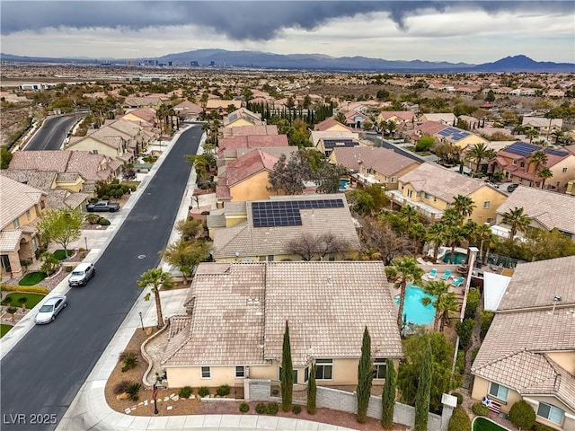 bird's eye view with a mountain view and a residential view