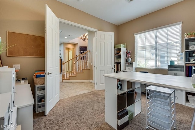 tiled office with baseboards, a notable chandelier, and carpet