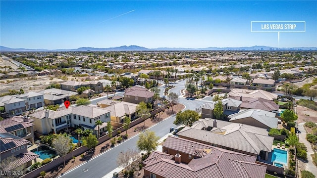 bird's eye view featuring a residential view and a mountain view