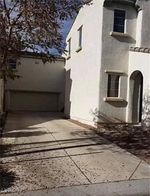 view of home's exterior with stucco siding