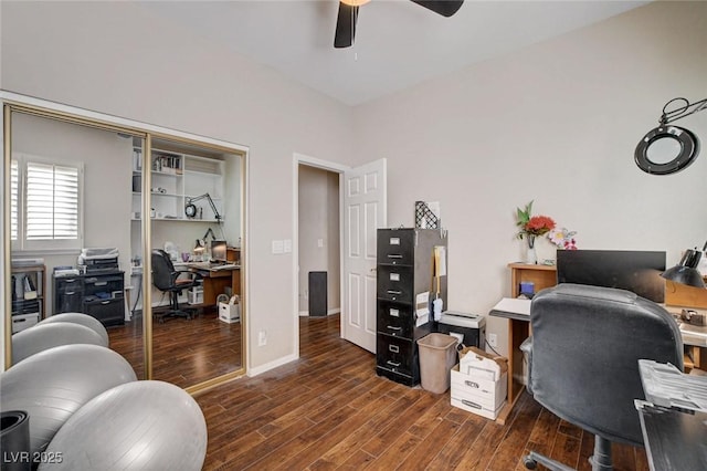 office space with baseboards, a ceiling fan, and wood finished floors