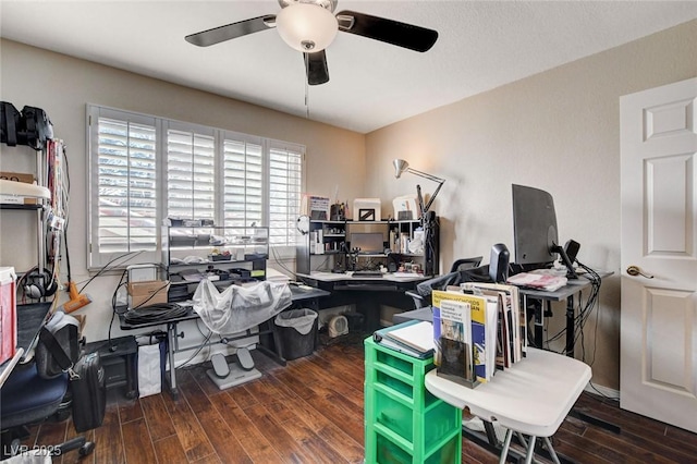 home office featuring wood finished floors and a ceiling fan