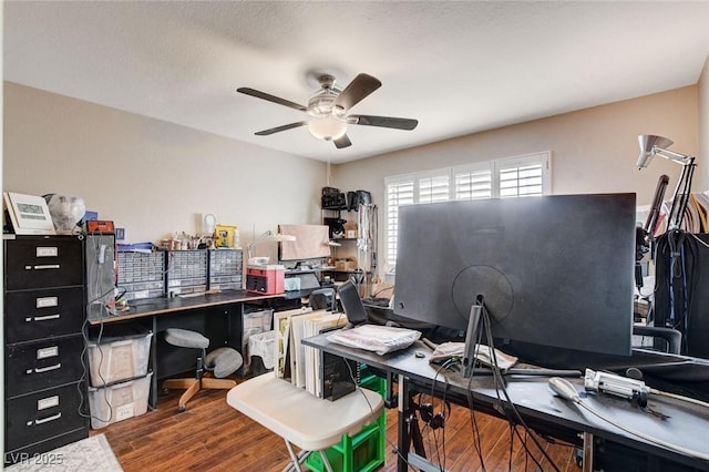 office space featuring ceiling fan and wood finished floors