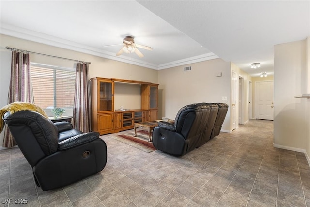 living area with ceiling fan, visible vents, and baseboards