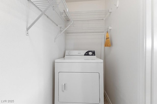 washroom with washer / dryer and laundry area