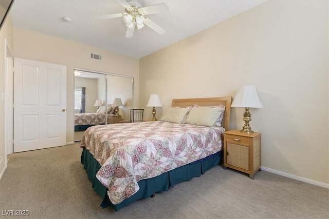 bedroom with carpet, a closet, visible vents, and baseboards